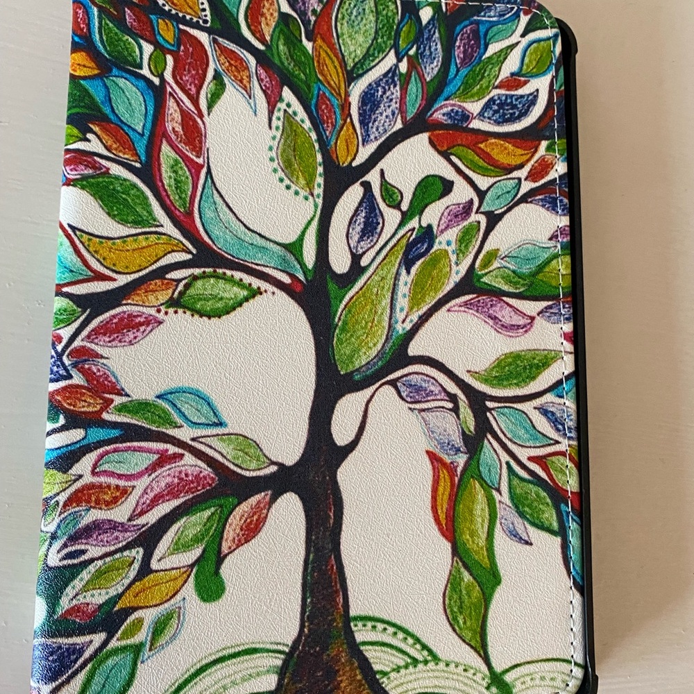 Kindle paper white cover. Never been used!